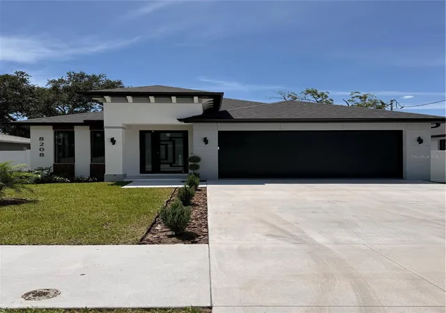 Photo 4 of Single family home for sale at 8208 N Elmer St, Tampa, FL 33604 | MLS# TB8537693 | Listing updated on 2026-09-10