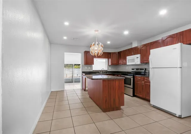 Photo 3 of Single family home for sale at 7413 N Arrawana Ave, Tampa, FL 33614 | MLS# O6432553 | Listing updated on 2026-09-13