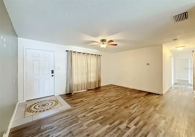 Photo 3 of Single family home for sale at 1405 Pembrook Dr, Leesburg, FL 34748 | MLS# O6432834 | Listing updated on 2026-09-13