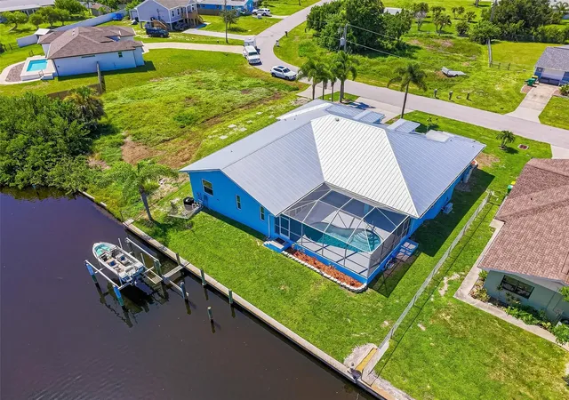 Photo 3 of Single family home for sale at 206 S Waterway Dr NW, Port Charlotte, FL 33952 | MLS# C7529496 | Listing updated on 2026-10-22