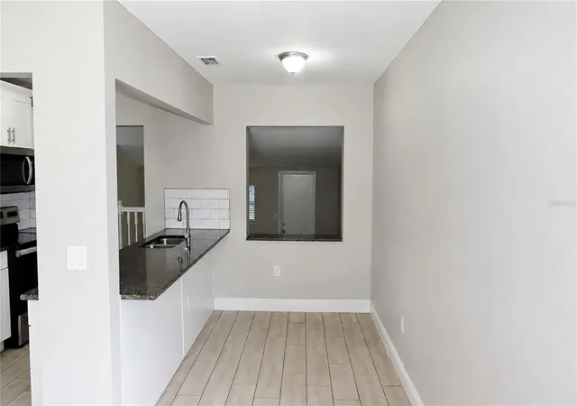 Photo 4 of Single family home for sale at 1241 Nicholson St, Clearwater, FL 33755 | MLS# TB8538254 | Listing updated on 2026-10-08