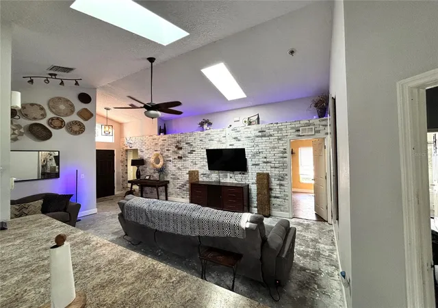 Photo 3 of Single family home for sale at 6473 Long Breeze Rd, Orlando, FL 32810 | MLS# O6433378 | Listing updated on 2026-09-21