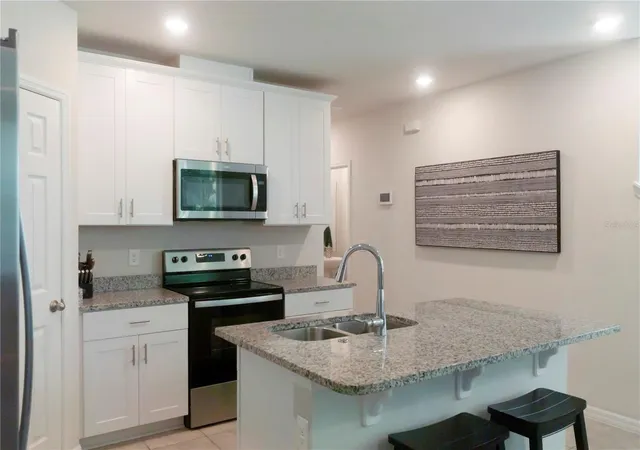 Photo 2 of Townhouse for sale at 1610 Grand Rue Dr, Casselberry, FL 32707 | MLS# O6433439 | Listing updated on 2026-09-12