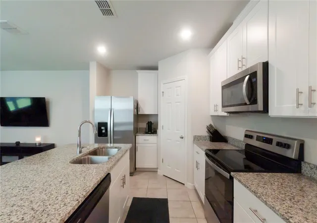 Photo 3 of Townhouse for sale at 1610 Grand Rue Dr, Casselberry, FL 32707 | MLS# O6433439 | Listing updated on 2026-09-12