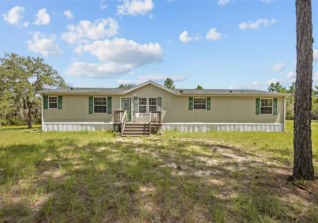 Photo 2 of Single family home for sale at 12251 Se 66 Place, Morriston, FL 32668 | MLS# O6433845 | Listing updated on 2026-09-11