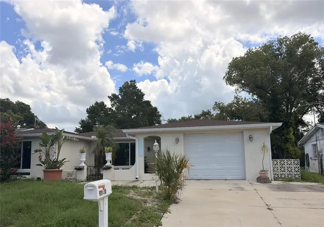 Photo 1 of Single family home for sale at 9830 Mark Twain Ln, Port Richey, FL 34668 | MLS# TB8539314 | Listing updated on 2026-09-26