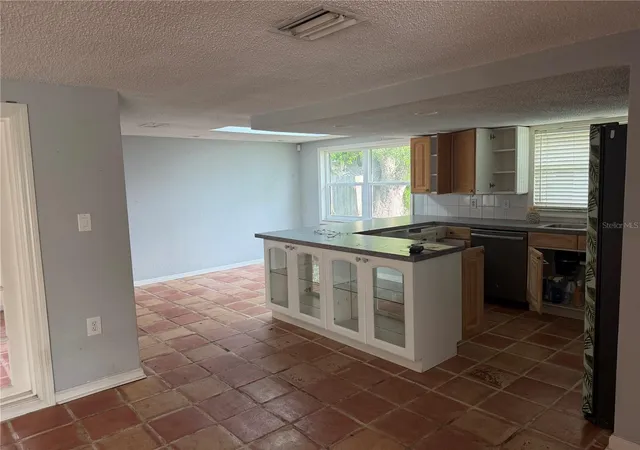 Photo 3 of Single family home for sale at 9830 Mark Twain Ln, Port Richey, FL 34668 | MLS# TB8539314 | Listing updated on 2026-09-26