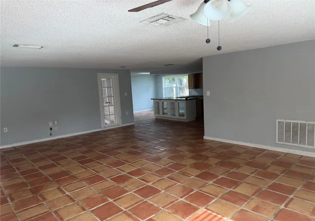 Photo 3 of Single family home for sale at 9830 Mark Twain Ln, Port Richey, FL 34668 | MLS# TB8539314 | Listing updated on 2026-09-26