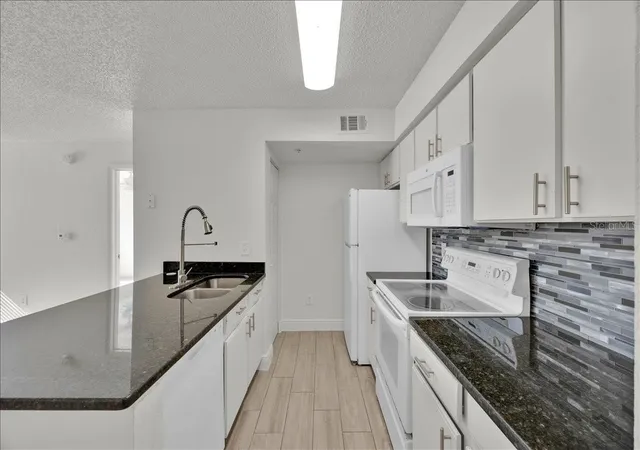 Photo 4 of Condo for sale at 2212 Grand Cayman Ct #1617, Kissimmee, FL 34741 | MLS# O6434484 | Listing updated on 2026-09-15