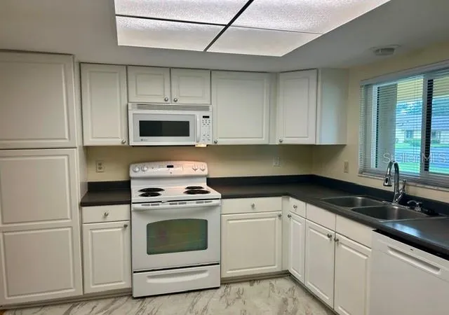 Photo 2 of Single family home for sale at 2506 Oakleaf Ln #25B, Clearwater, FL 33763 | MLS# TB8540058 | Listing updated on 2026-10-05