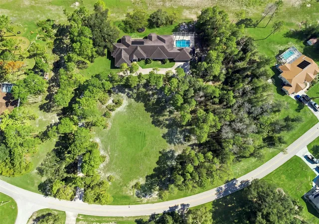 Photo 3 of Single family home for sale at 11200 Woodland Waters Blvd, Weeki Wachee, FL 34613 | MLS# W7888704 | Listing updated on 2026-10-02
