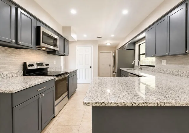 Photo 4 of Single family home for sale at 1612 Martin Luther King Jr Ave, Lakeland, FL 33805 | MLS# A4703406 | Listing updated on 2026-10-21