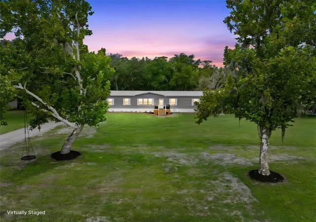 Photo 1 of Manufactured home for sale at 4045 Loury Dr, Wesley Chapel, FL 33543 | MLS# TB8540348 | Listing updated on 2026-09-12