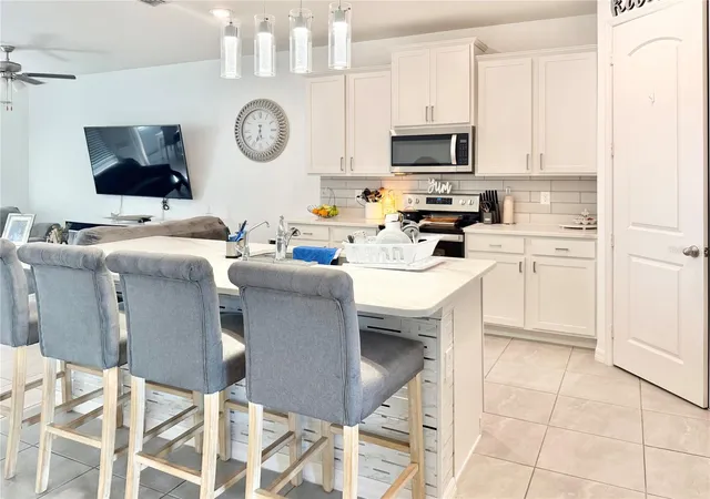 Photo 4 of Townhouse for sale at 11287 Cay Spruce Way, San Antonio, FL 33576 | MLS# TB8540643 | Listing updated on 2026-09-10