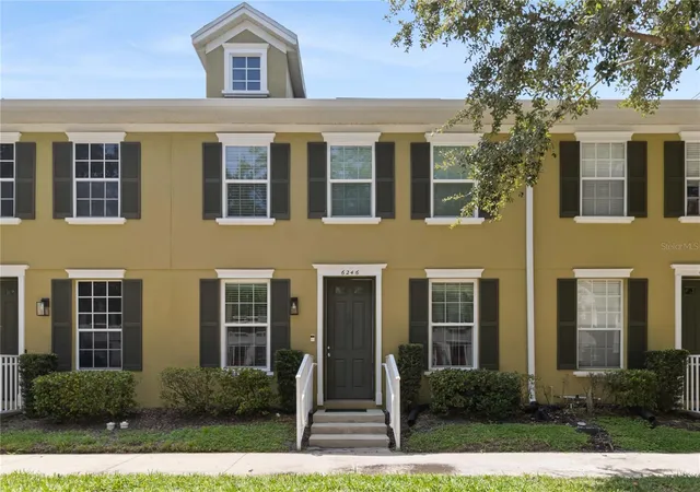 Photo 1 of Townhouse for sale at 6246 Westcott Cove Blvd, Orlando, FL 32829 | MLS# O6435329 | Listing updated on 2026-10-02