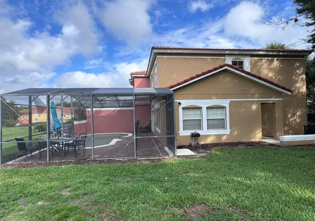 Photo 2 of Townhouse for sale at 3050 Secret Lake Dr, Kissimmee, FL 34747 | MLS# O6435405 | Listing updated on 2026-09-15