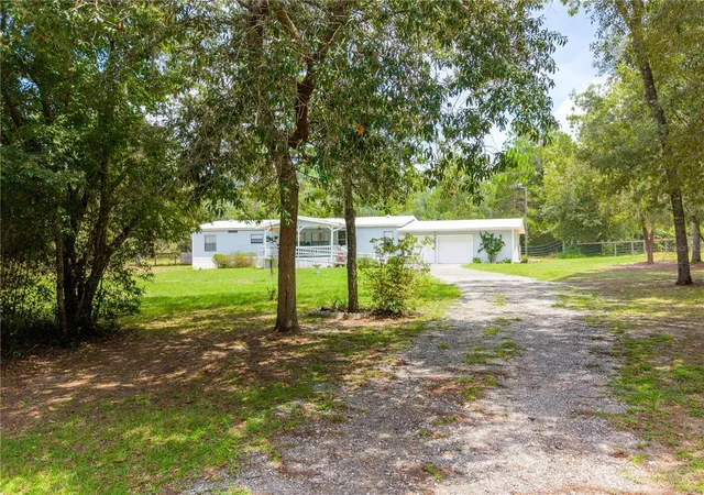 Photo 2 of Manufactured home for sale at 6863 Deer Springs Rd, Keystone Heights, FL 32656 | MLS# GC542905 | Listing updated on 2026-09-11