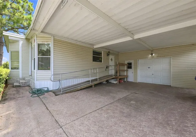 Photo 2 of Manufactured home for sale at 3215 Wekiva Rd, Tavares, FL 32778 | MLS# O6435474 | Listing updated on 2026-09-11