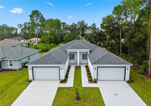 Photo 1 of Multi family home for sale at 8 Second Path #A & B, Palm Coast, FL 32164 | MLS# FC320867 | Listing updated on 2026-10-06