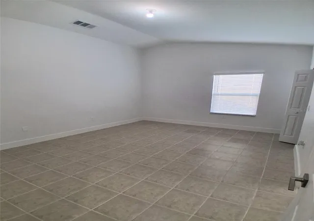 Photo 4 of Single family home for sale at 1047 Florida Holly Dr, Orlando, FL 32811 | MLS# O6435731 | Listing updated on 2026-09-15