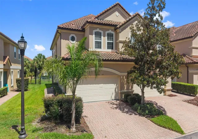 Photo 1 of Townhouse for sale at 8760 The Esplanade #50, Orlando, FL 32836 | MLS# O6436023 | Listing updated on 2026-09-09
