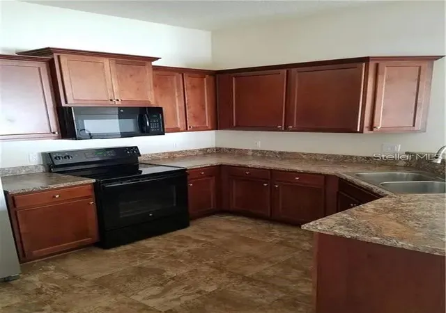 Photo 3 of Sale Pending at 1353 N Platte Ct, Kissimmee, FL 34759 | MLS# O6436188 | Listing updated on 2026-09-11