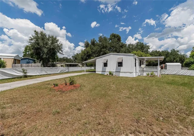 Photo 1 of Manufactured home for sale at 8913 Jericho Ct, Polk City, FL 33868 | MLS# TB8542020 | Listing updated on 2026-10-03