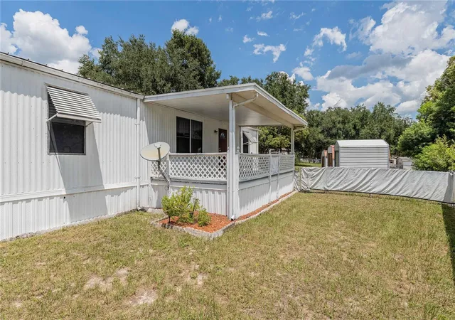 Photo 2 of Manufactured home for sale at 8913 Jericho Ct, Polk City, FL 33868 | MLS# TB8542020 | Listing updated on 2026-10-03