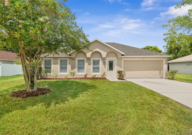 Photo 1 of Single family home for sale at 34 Firethorn Ln, Palm Coast, FL 32137 | MLS# FC320959 | Listing updated on 2026-10-06