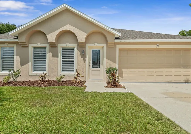 Photo 3 of Single family home for sale at 34 Firethorn Ln, Palm Coast, FL 32137 | MLS# FC320959 | Listing updated on 2026-10-06