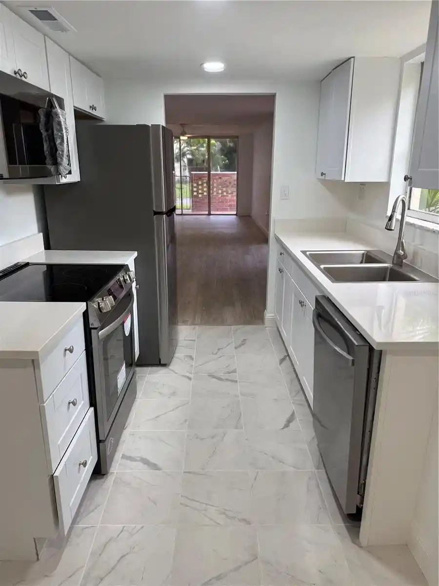 Listing Photo 2 - Condo for sale in 1012 Pearce Dr located at 1012 Pearce Dr, Clearwater, FL 33764 - Unit #111