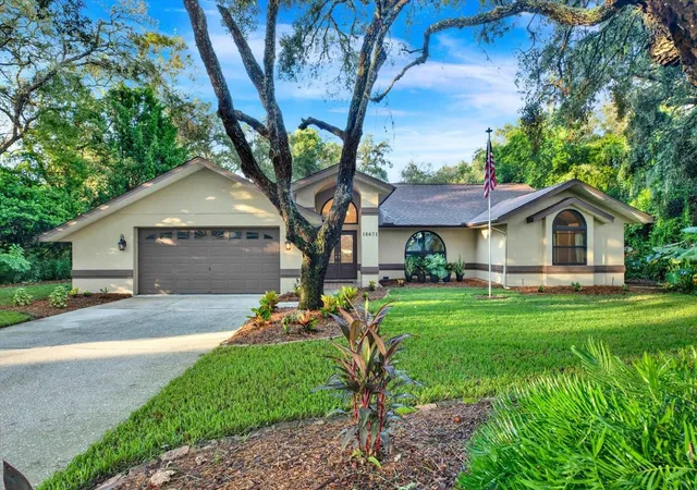 Photo 1 of Single family home for sale at 18671 Autumn Lake Ave, Hudson, FL 34667 | MLS# W7888966 | Listing updated on 2026-10-07