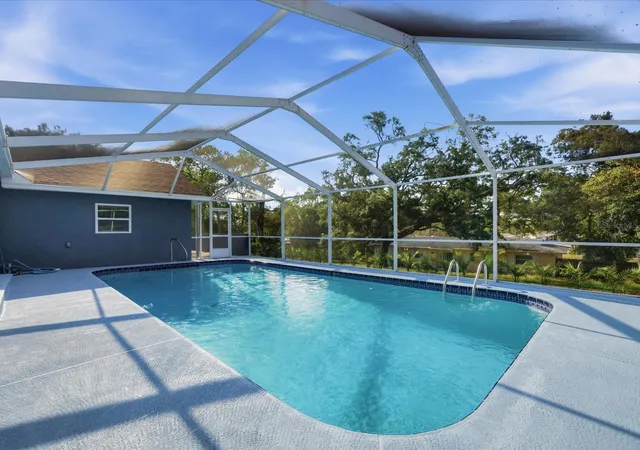 Photo 3 of Single family home for sale at 6063 Airmont Dr, Spring Hill, FL 34606 | MLS# W7888967 | Listing updated on 2026-09-10