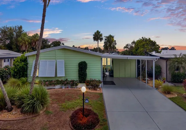 Photo 1 of Manufactured home for sale at 8479 Imperial Cir, Palmetto, FL 34221 | MLS# A4704314 | Listing updated on 2026-10-06