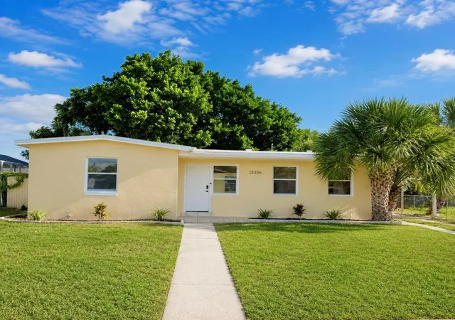 Photo 1 of Single family home for sale at 21330 Meehan Ave, Port Charlotte, FL 33952 | MLS# A4704414 | Listing updated on 2026-09-10