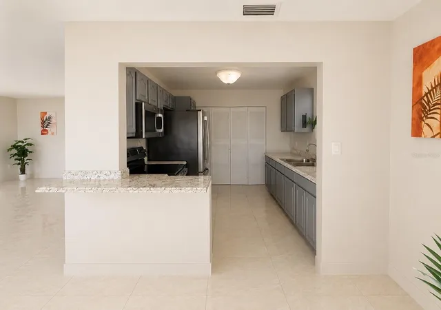 Photo 3 of Single family home for sale at 21330 Meehan Ave, Port Charlotte, FL 33952 | MLS# A4704414 | Listing updated on 2026-09-10