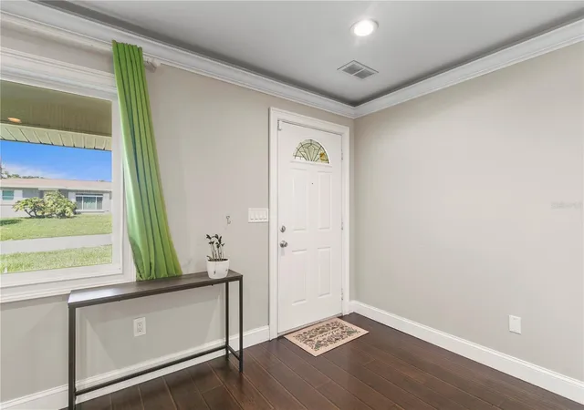 Photo 3 of Single family home for sale at 1009 Woodley Rd, Clearwater, FL 33764 | MLS# TB8543625 | Listing updated on 2026-09-12