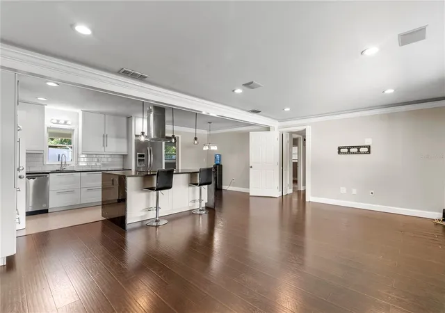 Photo 4 of Single family home for sale at 1009 Woodley Rd, Clearwater, FL 33764 | MLS# TB8543625 | Listing updated on 2026-09-12