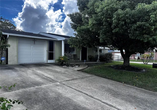 Photo 1 of Single family home for sale at 9040 Chatam Ln, Port Richey, FL 34668 | MLS# W7889043 | Listing updated on 2026-09-12