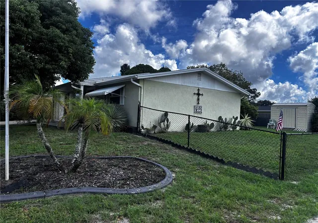 Photo 2 of Single family home for sale at 9040 Chatam Ln, Port Richey, FL 34668 | MLS# W7889043 | Listing updated on 2026-09-12