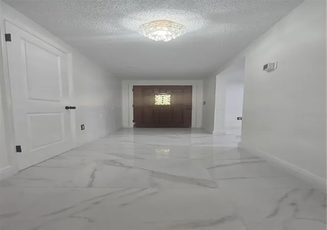 Photo 2 of Single family home for sale at 6954 Stone Rd, Port Richey, FL 34668 | MLS# TB8543907 | Listing updated on 2026-09-11