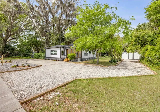 Photo 2 of Single family home for sale at 1956 Pioneer Trl, New Smyrna Beach, FL 32168 | MLS# TB8543942 | Listing updated on 2026-09-15