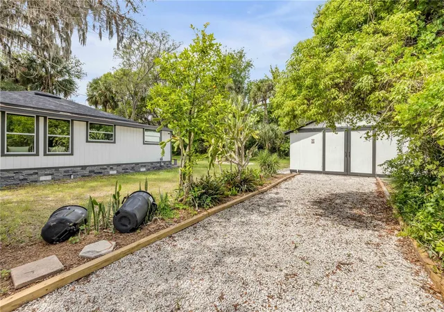 Photo 3 of Single family home for sale at 1956 Pioneer Trl, New Smyrna Beach, FL 32168 | MLS# TB8543942 | Listing updated on 2026-09-15