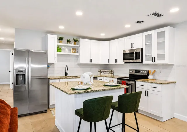 Photo 3 of Single family home for sale at 482 Oakwood Dr, Dunedin, FL 34698 | MLS# TB8544354 | Listing updated on 2026-09-13