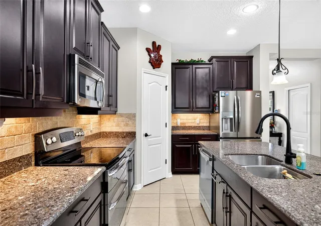 Photo 4 of Single family home for sale at 2586 Plumadore Dr, Grand Island, FL 32735 | MLS# O6438172 | Listing updated on 2026-09-12