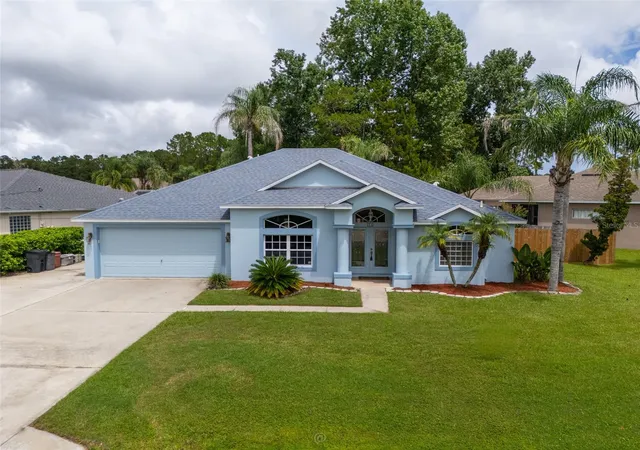 Photo 1 of Single family home for sale at 34 Woodholme Ln, Palm Coast, FL 32164 | MLS# FC321144 | Listing updated on 2026-10-03