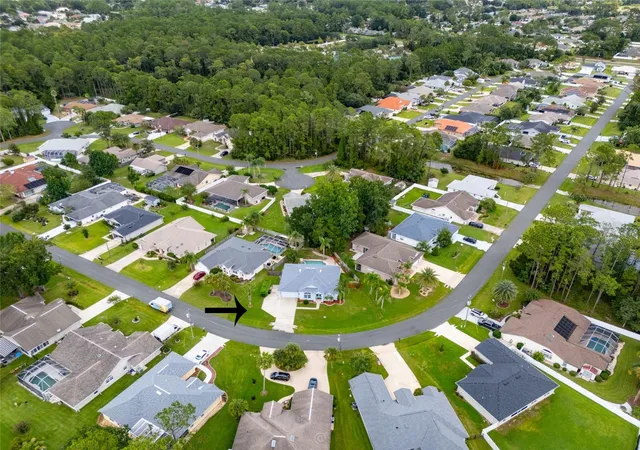 Photo 3 of Single family home for sale at 34 Woodholme Ln, Palm Coast, FL 32164 | MLS# FC321144 | Listing updated on 2026-10-03