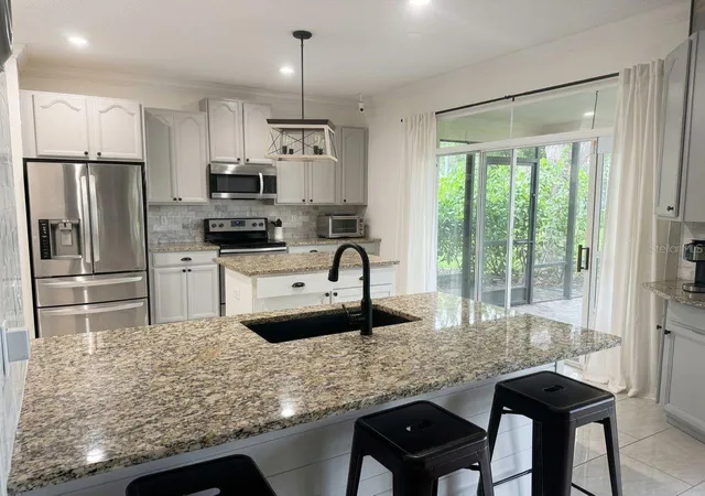 Photo 3 of Single family home for sale at 389 Lakepark Trl, Oviedo, FL 32765 | MLS# S5156756 | Listing updated on 2026-10-03