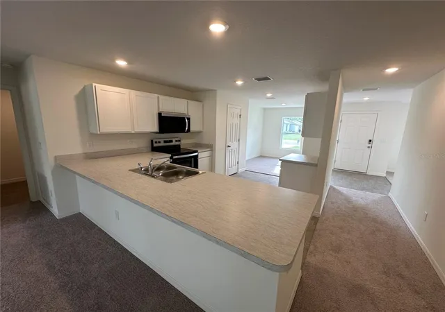 Photo 4 of Single family home for sale at 7 Reidsville Dr, Palm Coast, FL 32164 | MLS# C7530252 | Listing updated on 2026-10-23