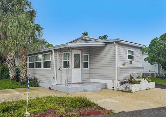 Photo 1 of Manufactured home for sale at 1100 University Pkwy #54, Sarasota, FL 34234 | MLS# TB8544868 | Listing updated on 2026-09-23
